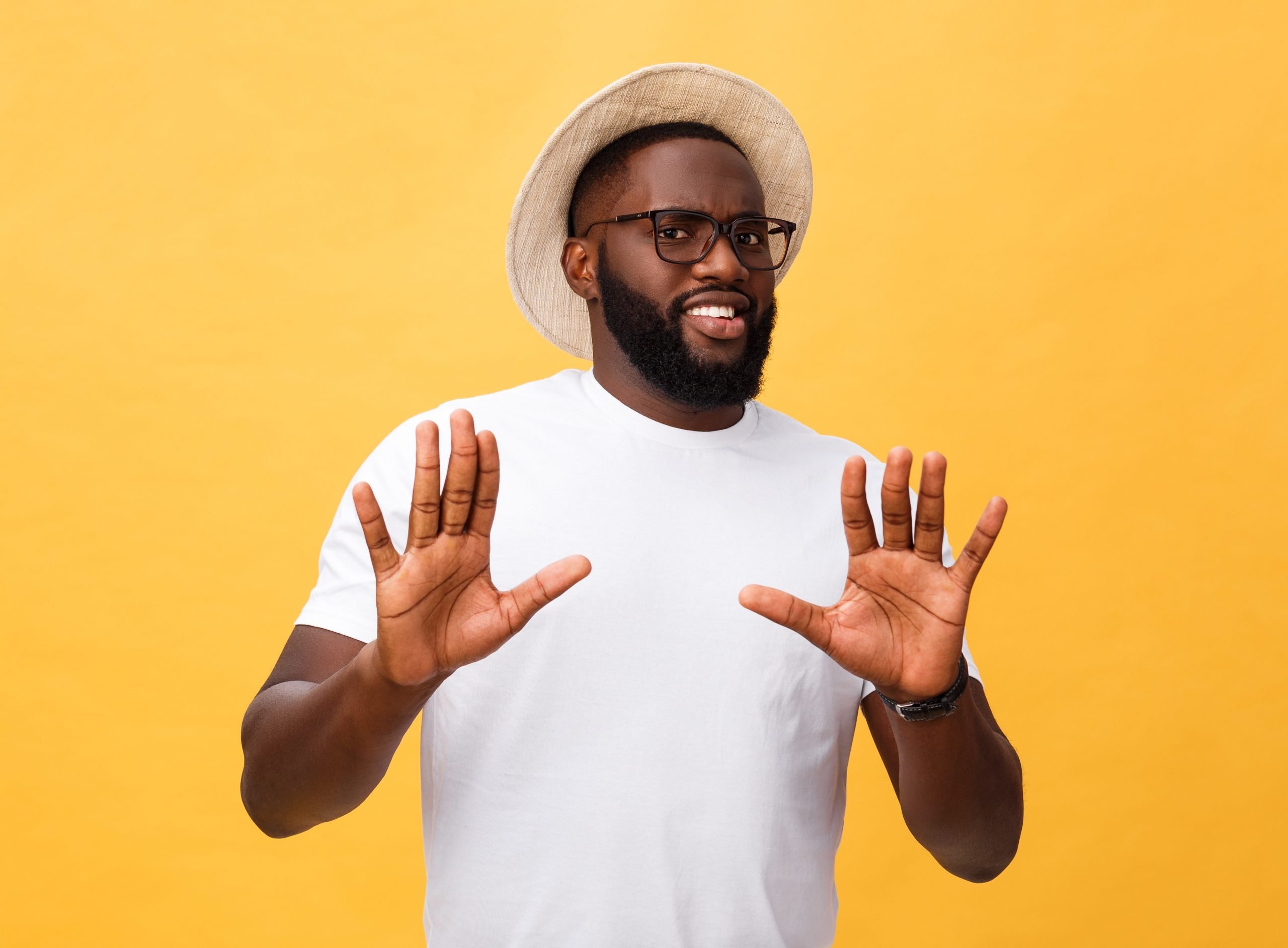 man making a sign of being reluctant